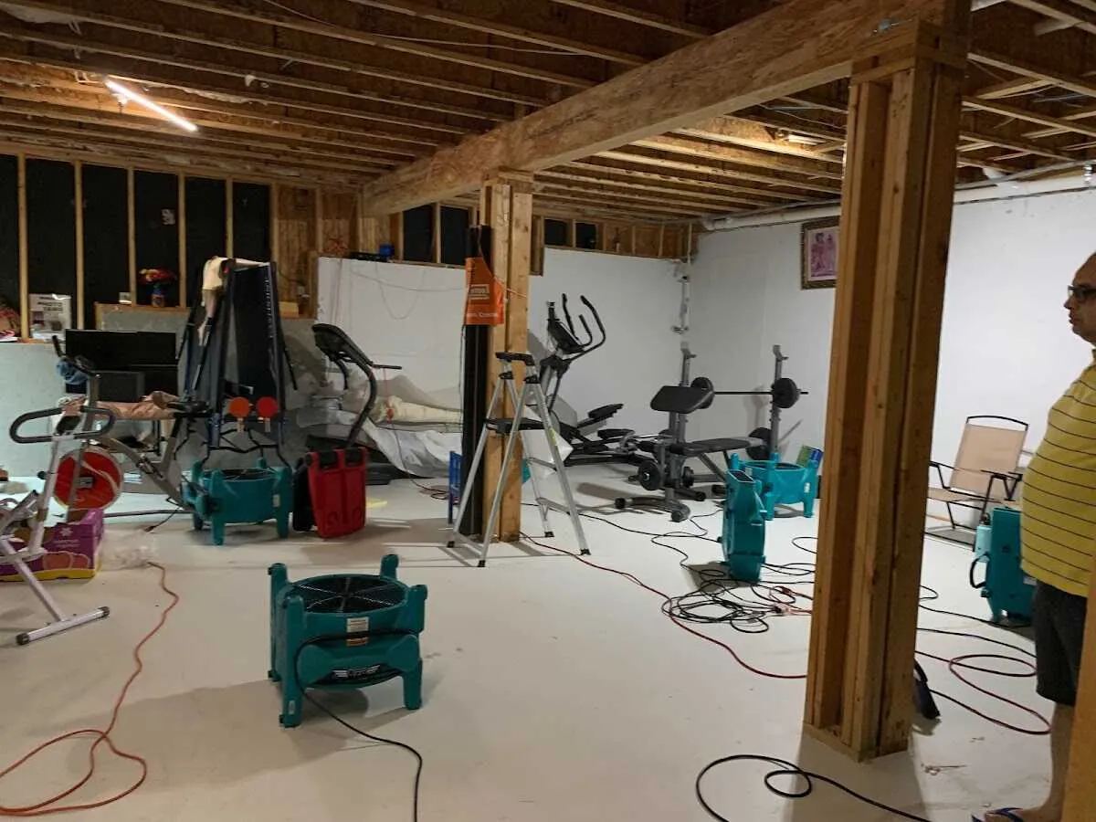 Basement drying equipment setup for Contents Cleaning & Restoration in East Longmeadow